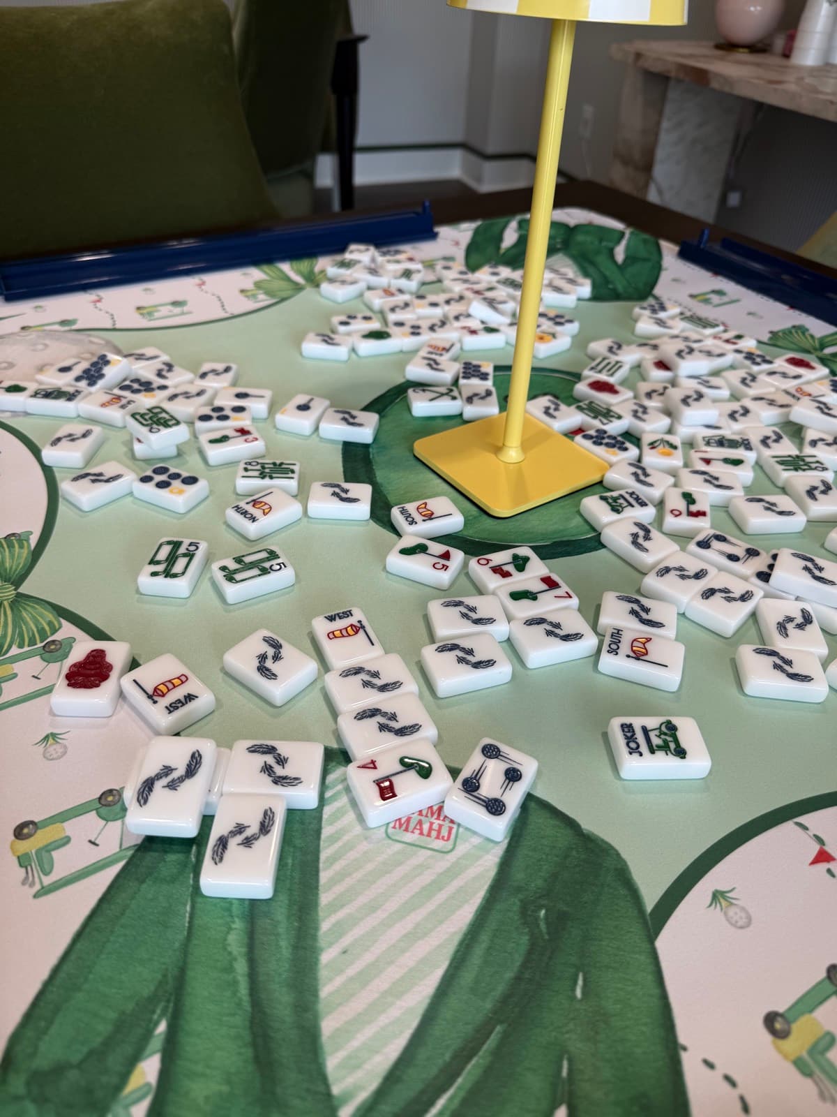 Friends gathered around the table on a Mahjong Open league night.